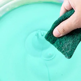 Take a small amount of the Lead Dishwash Tub with a wet sponge scrubber.