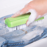 Scrub it in with a brush to remove tough stains.